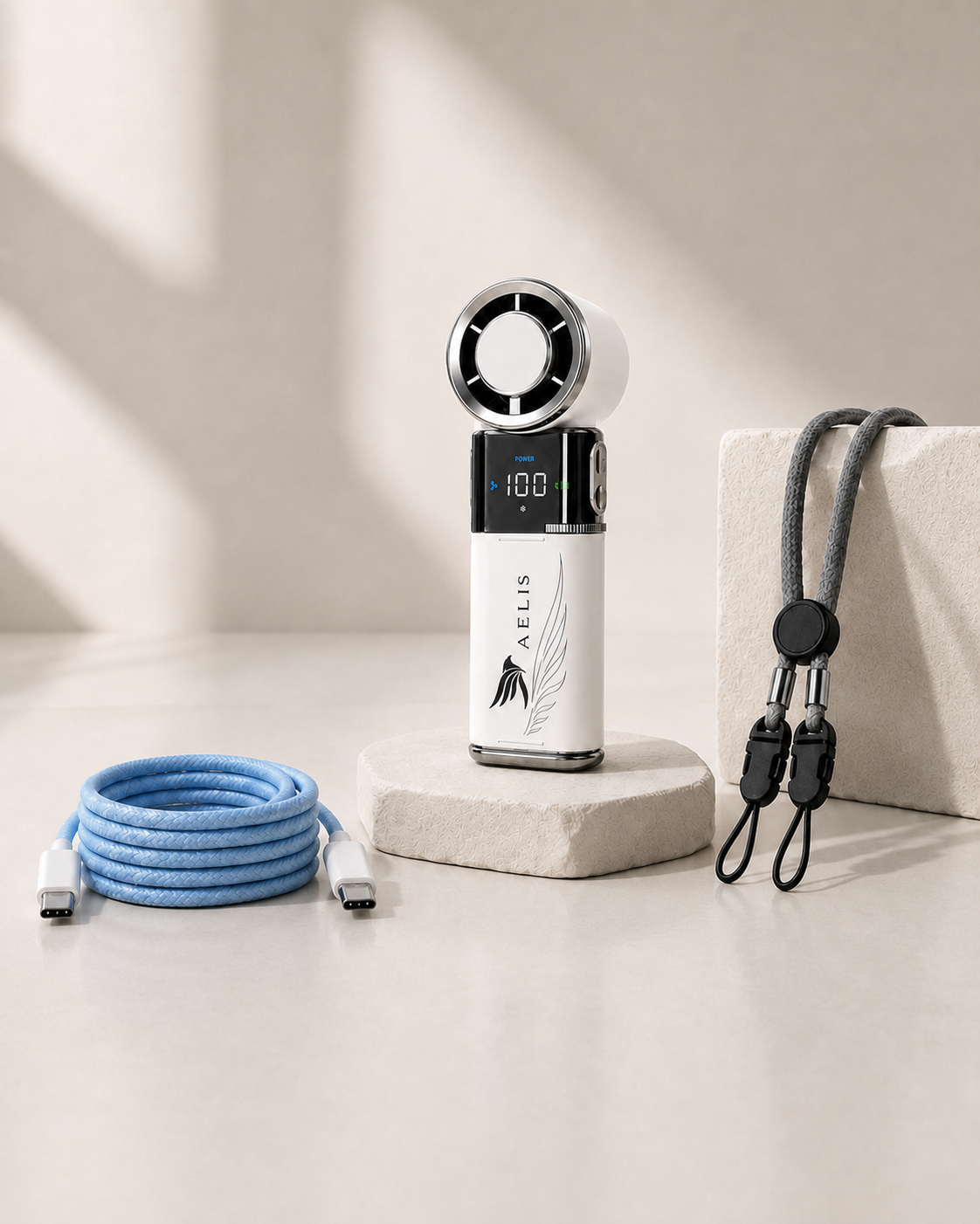 AELIS Performance Lieferumfang mit korrektem Performance Gerät, USB-C-Kabel und Trageschlaufe